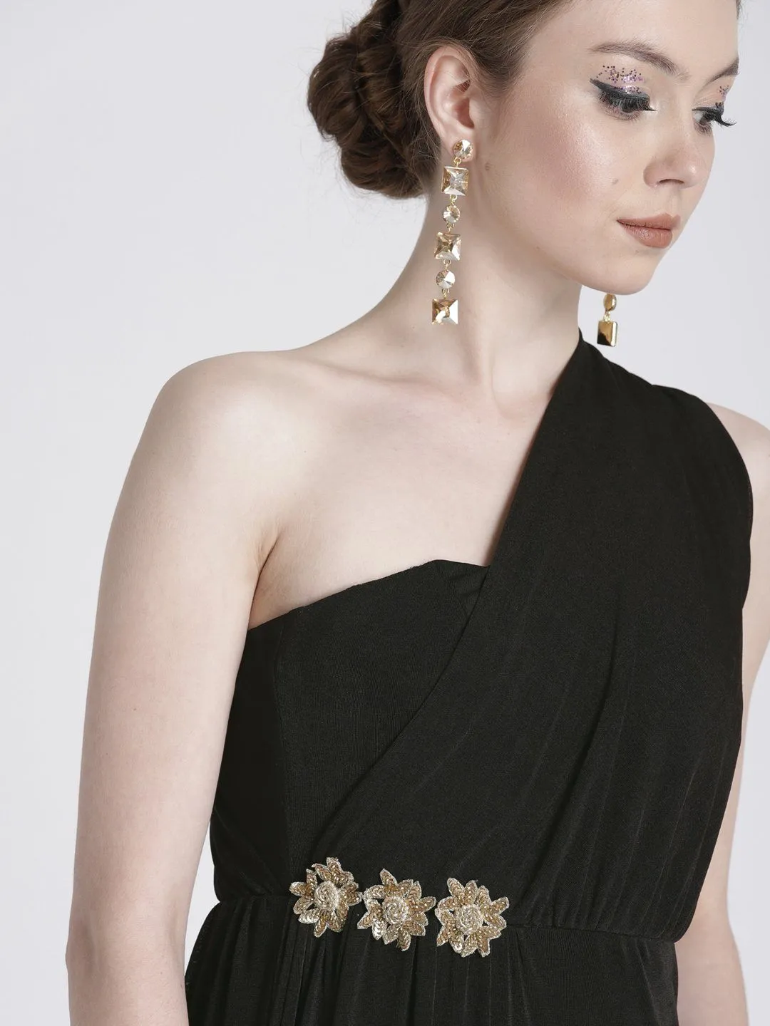 BLACK ONE SHOULDER GOWN WITH WAIST EMBELLISHMENT